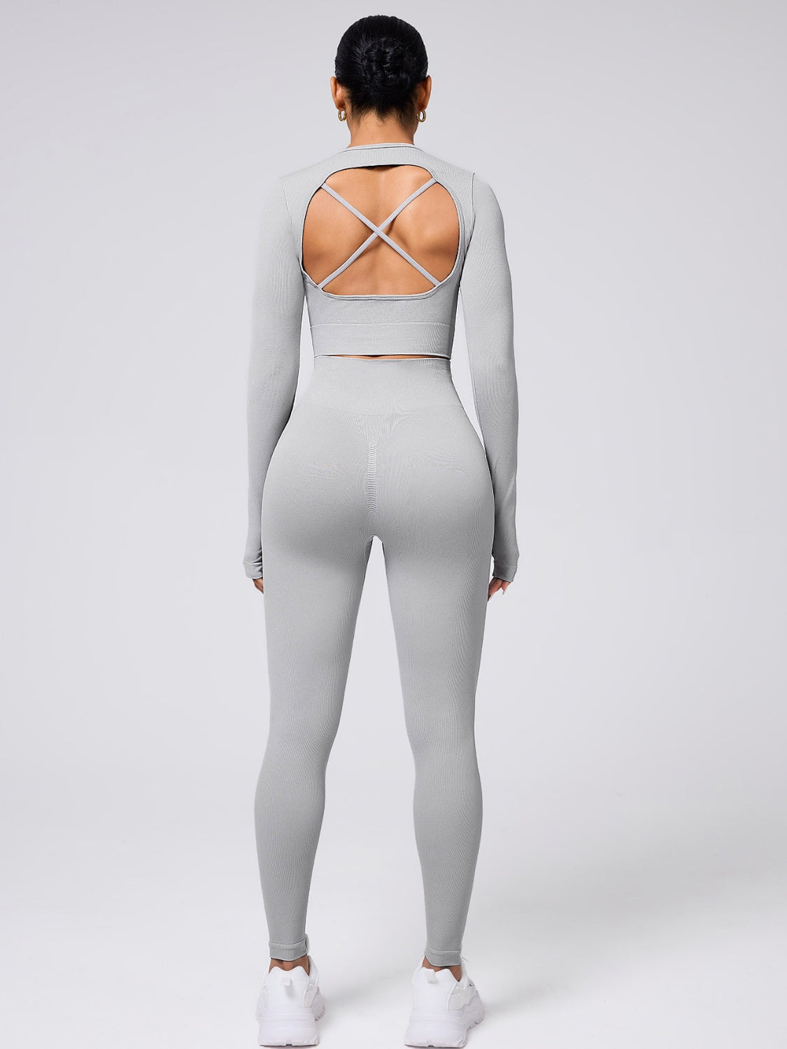 Stylish Back Crisscross Round Neck Long Sleeve Top and Leggings Active Set in gray, perfect for workouts and casual wear.