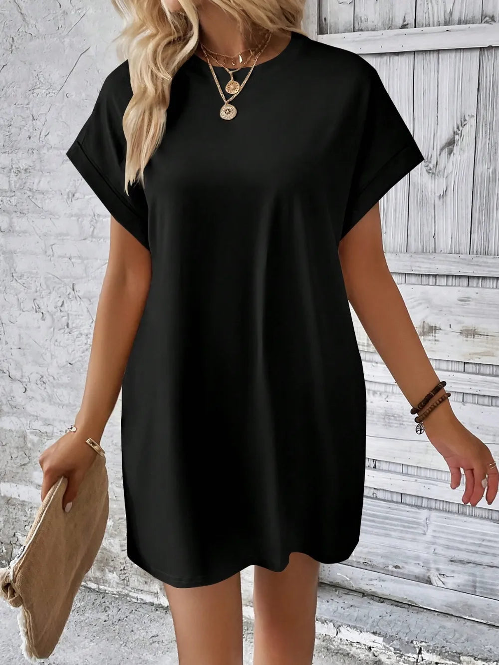 Black basic style Round Neck Short Sleeve Mini Dress made of 95% polyester and 5% spandex, machine washable, imported.
