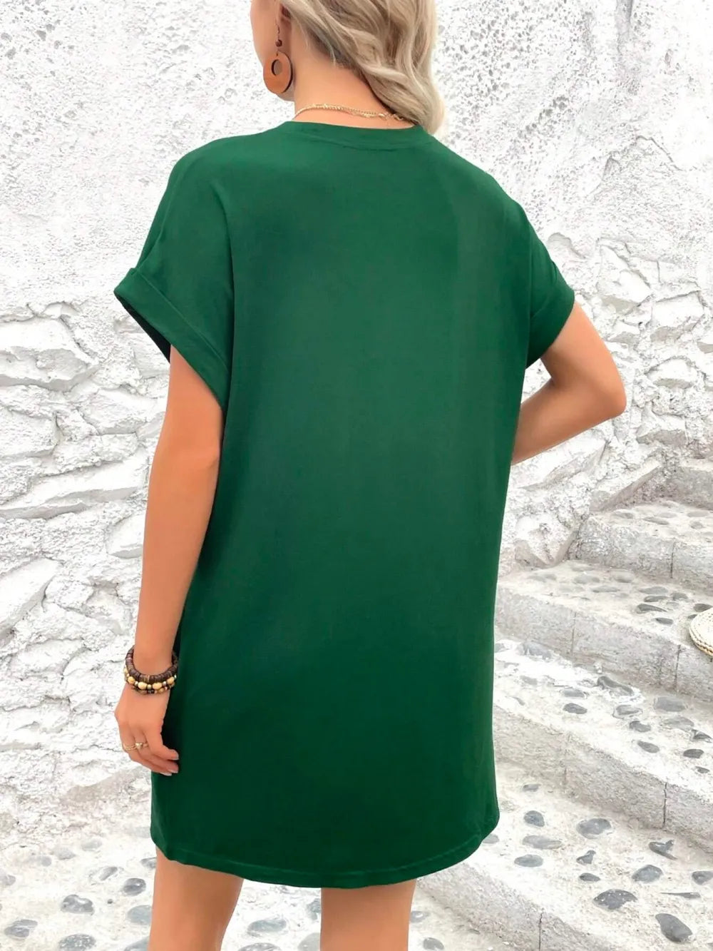 Green Round Neck Short Sleeve Mini Dress with a simple style, slightly stretchy fabric, perfect for casual wear.