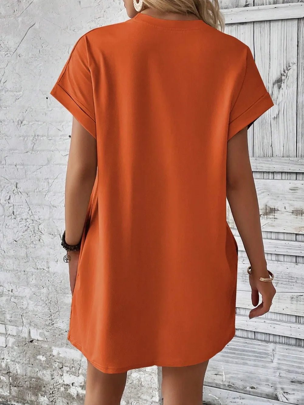 Slightly stretchy black Round Neck Short Sleeve Mini Dress with opaque fabric, basic style, and machine washable comfort.