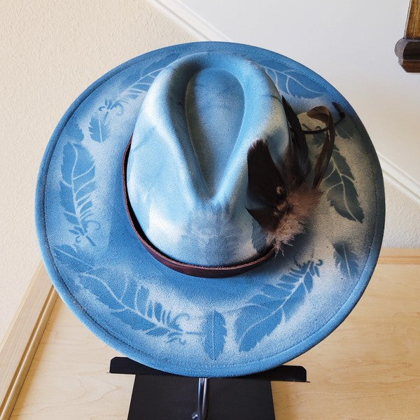 Custom Hand-Painted Branded Cowgirl Western Boho Hat with feather embellishments and leather band for a unique western style.