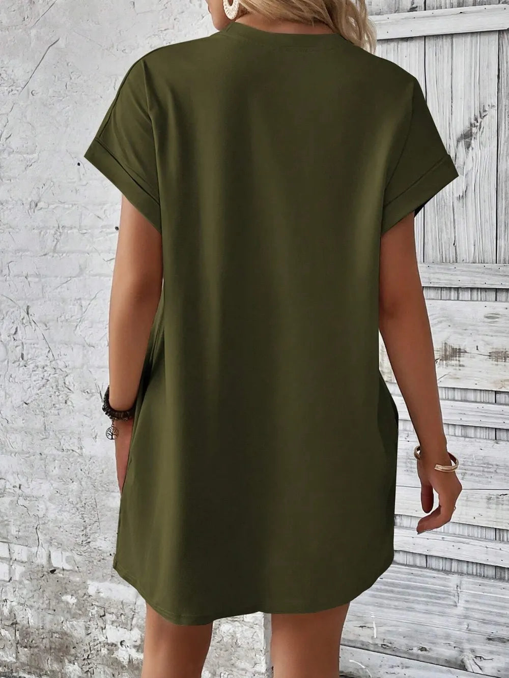 Light green rounded neck short sleeve mini dress with stretchy, opaque fabric from Fashion Store, size small.