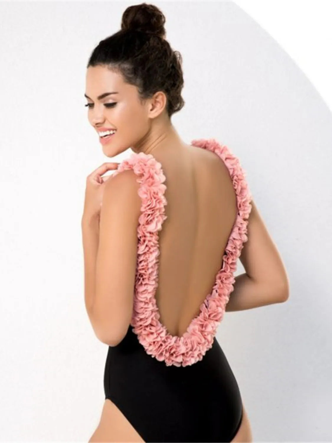 Stylish Backless Petal Strap Parent-Child Swimsuit perfect for mother-daughter beach days. Made with 82% polyester.