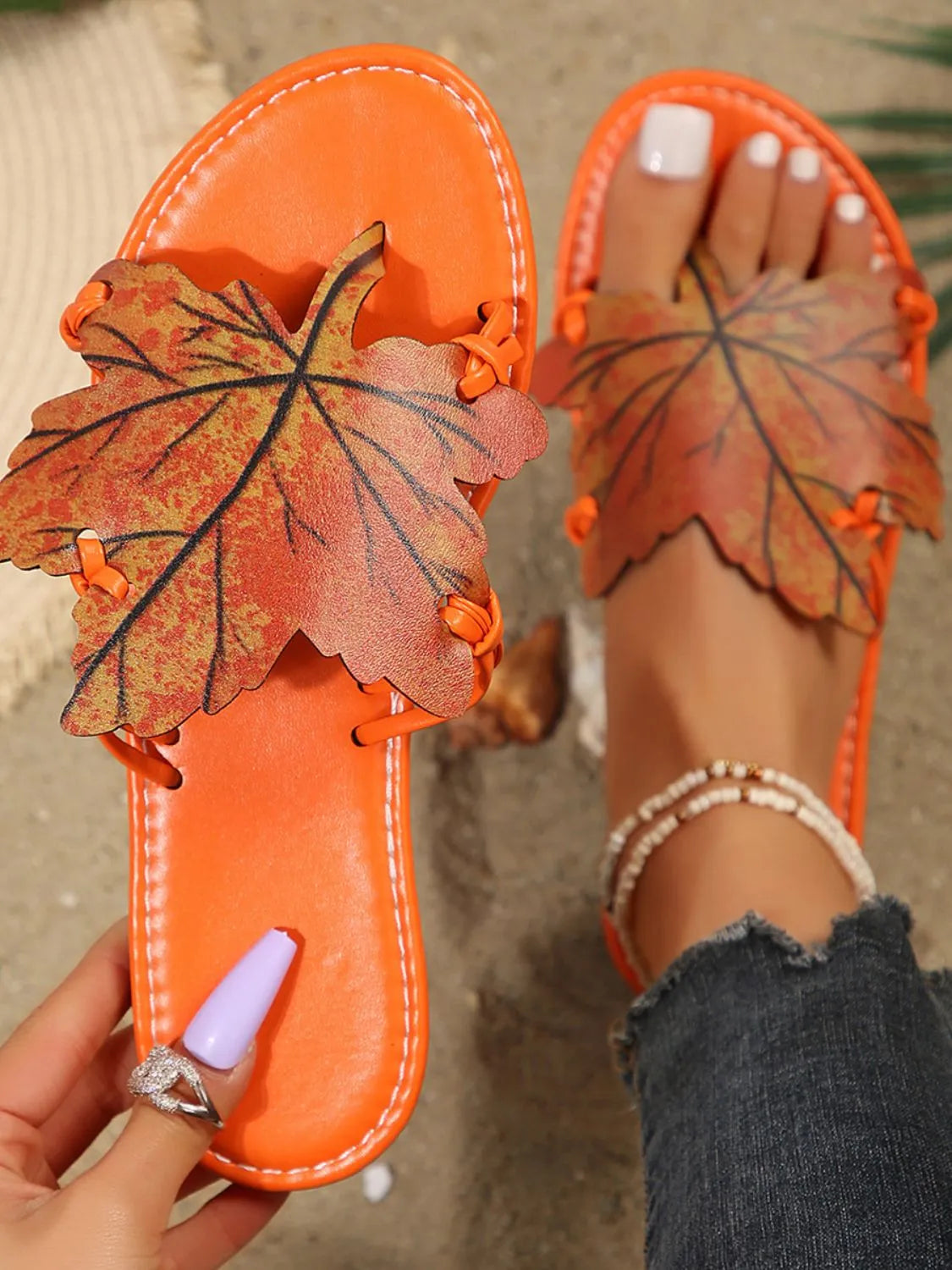 Bright orange open toe flats slippers with leaf embellishments, made of PU leather and rubber, true to size, imported.