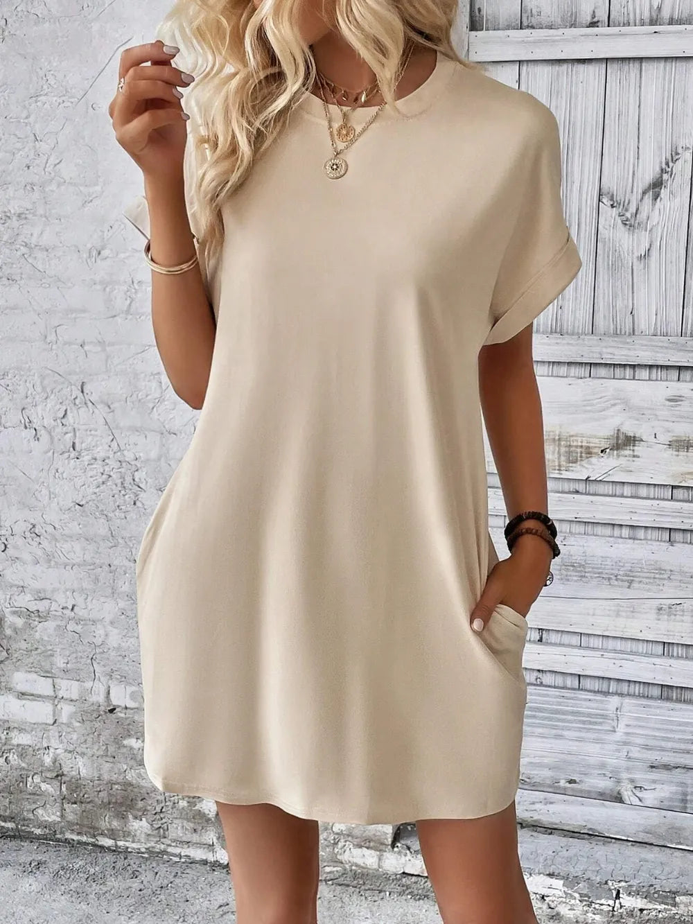 Slightly stretchy beige Round Neck Short Sleeve Mini Dress with opaque material, perfect for casual or chic looks.