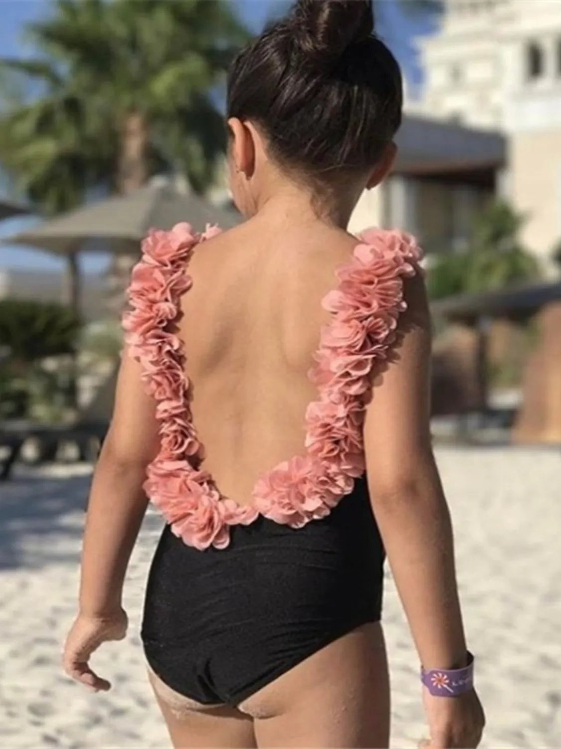 Stylish Backless Petal Strap Parent-Child Swimsuit, perfect for mothers and daughters enjoying summer fun.