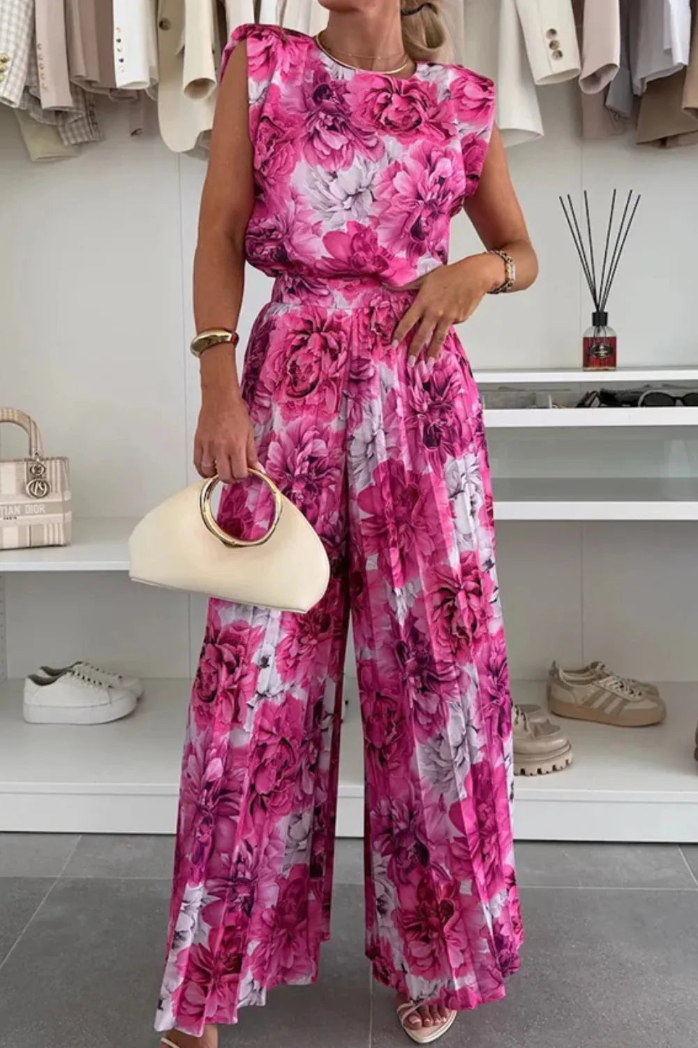 Stylish Round Neck Top and Pleated Pants Set in vibrant floral print, perfect for any occasion.