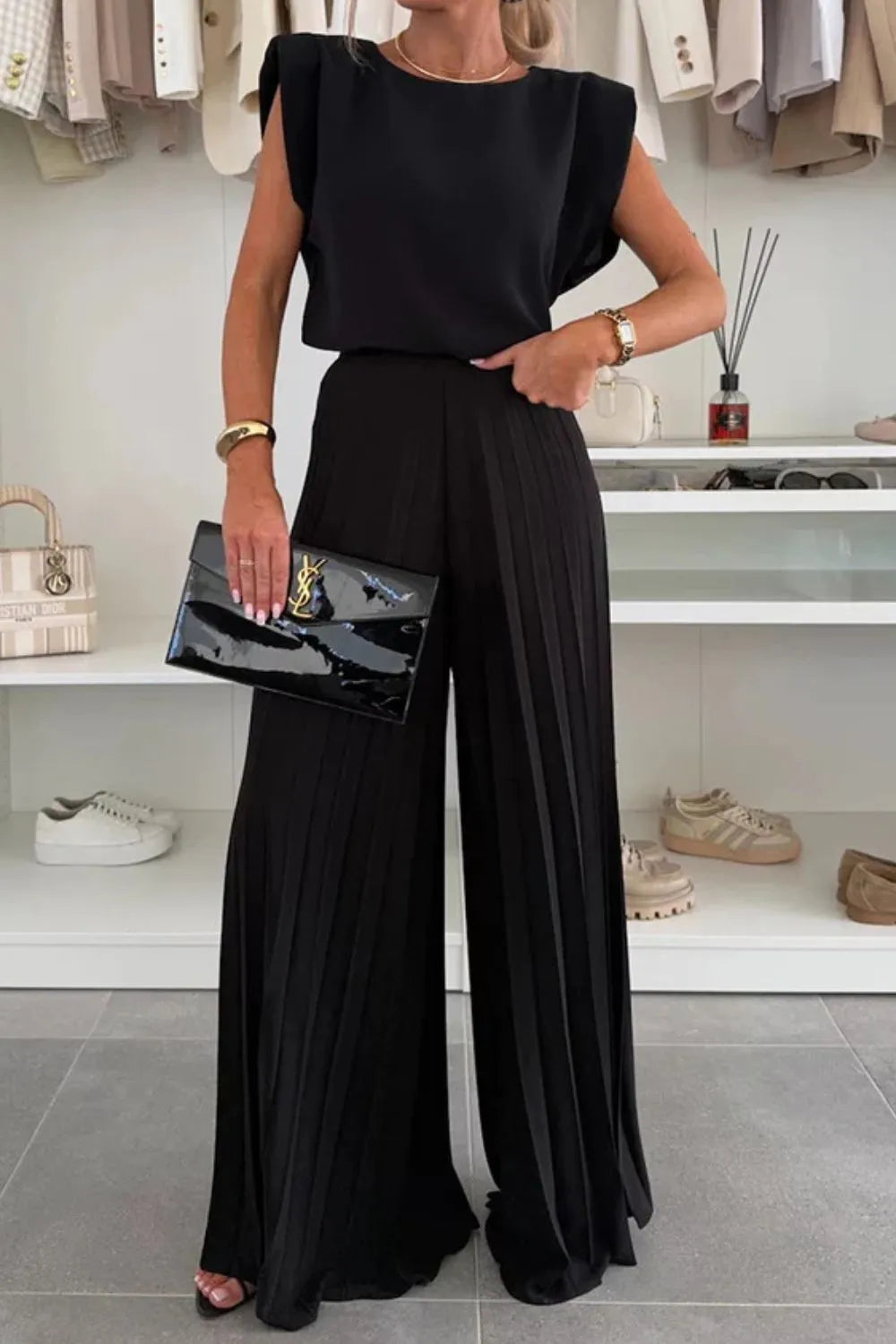 Sleek Round Neck Top and Pleated Pants Set, perfect for stylish outings, made of 100% polyester for comfort.