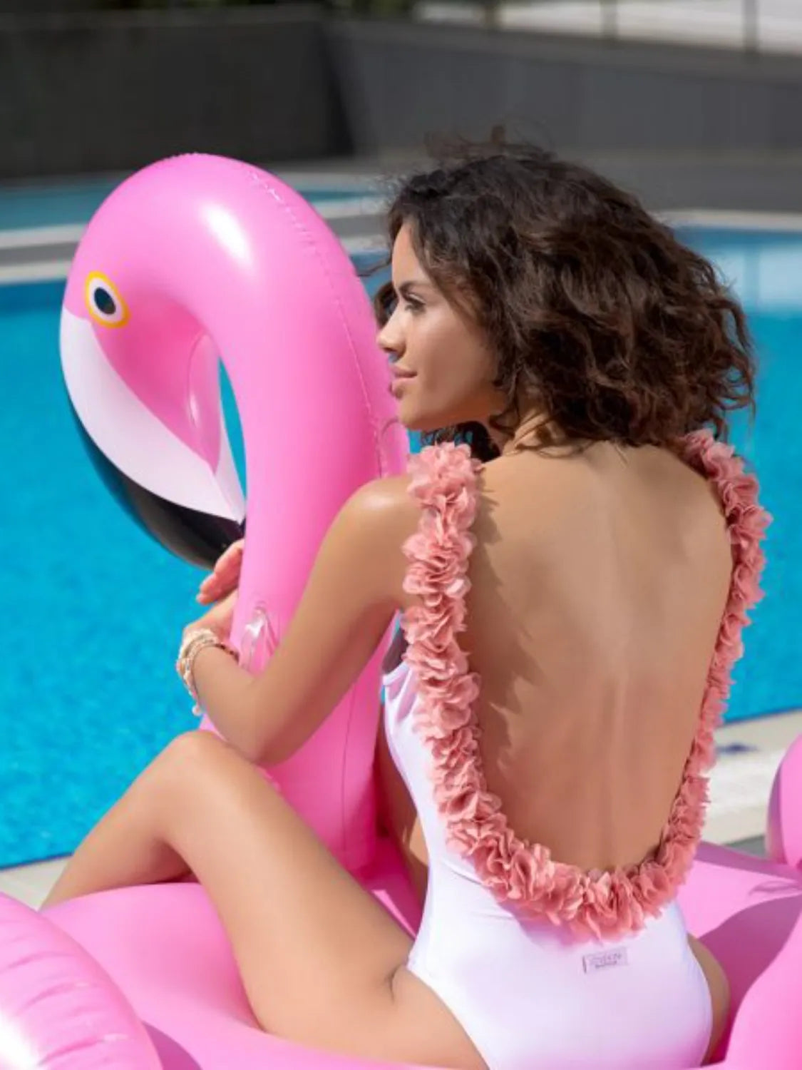 Stylish Backless Petal Strap Parent-Child Swimsuit perfect for mother and daughter beach days. Soft and easy-care material.