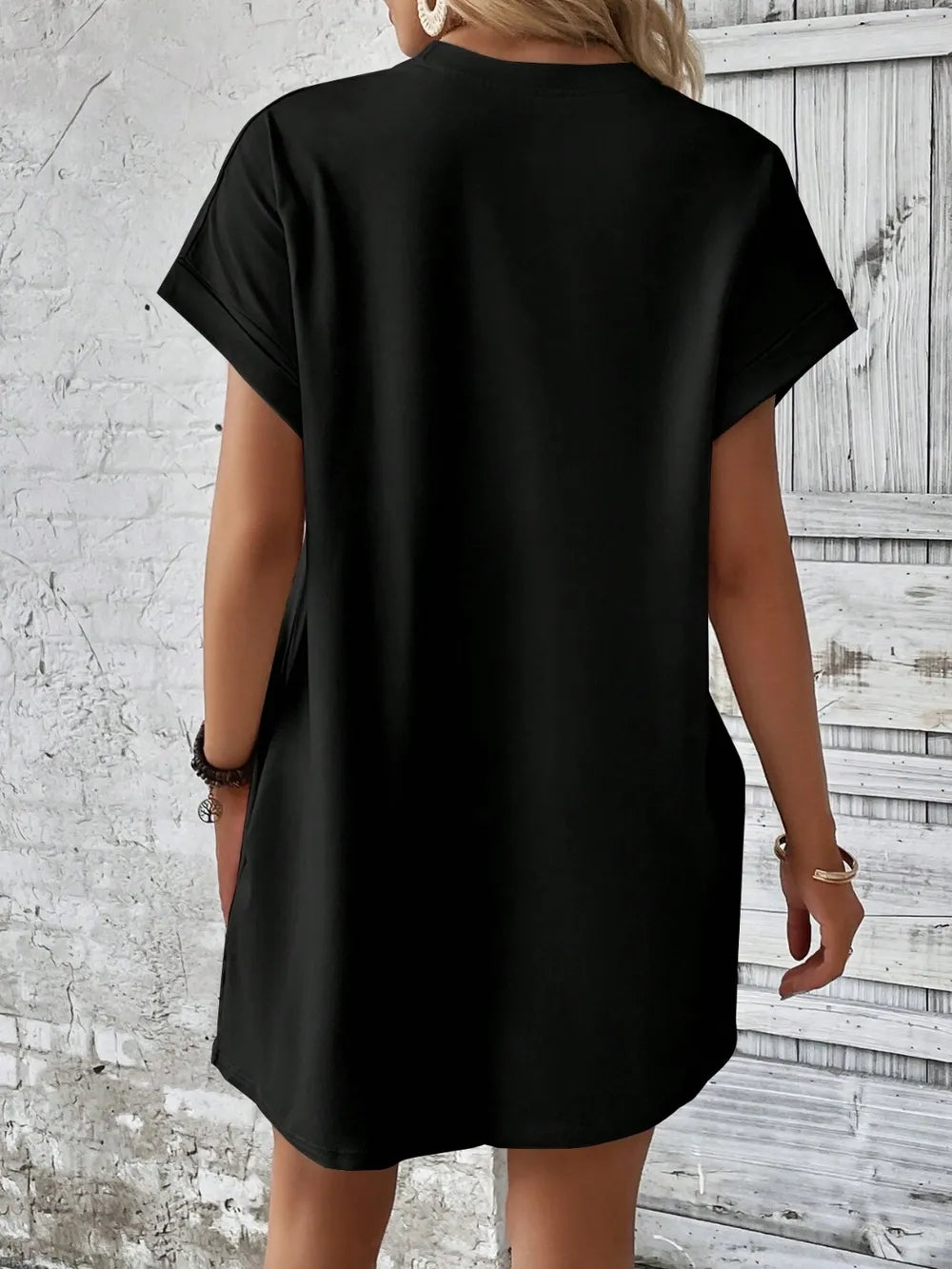 Black Round Neck Short Sleeve Mini Dress with a basic style, slightly stretchy fabric, imported from FashionHub.