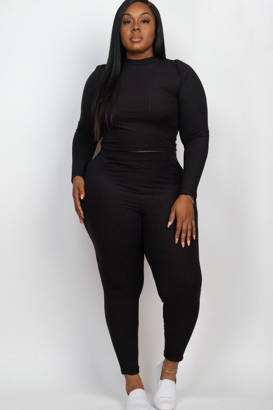 Plus Ribbed Mock Neck Long Sleeve Top&Leggings Set on a plus-size model in black ribbed fabric.