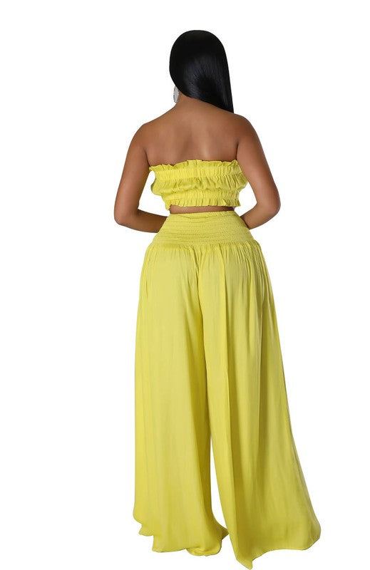 Stylish FASHION WOMEN TWO PIECE SET featuring a bralette and high waist wide leg pants in vibrant yellow.