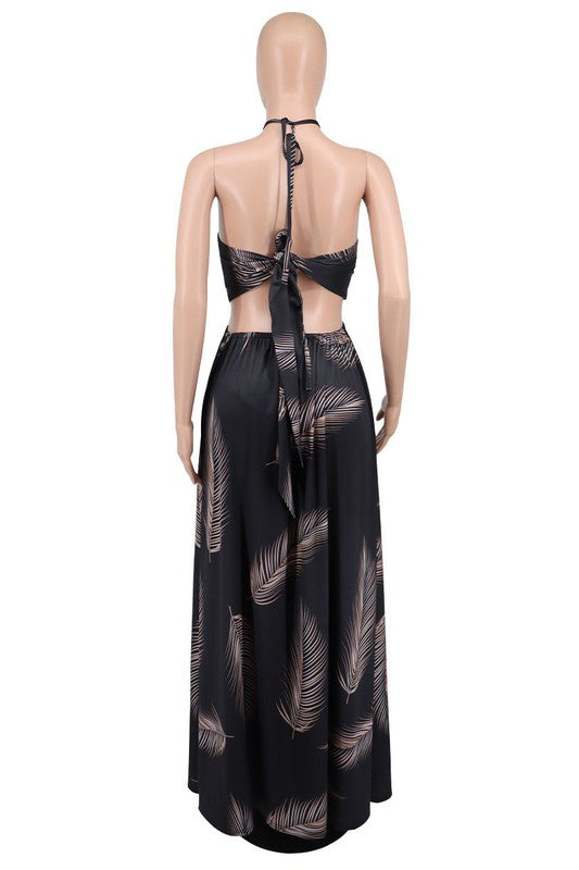 Stylish Halter Neck Maxi Dress featuring a deep neckline, open back, and elegant draping, perfect for any occasion.