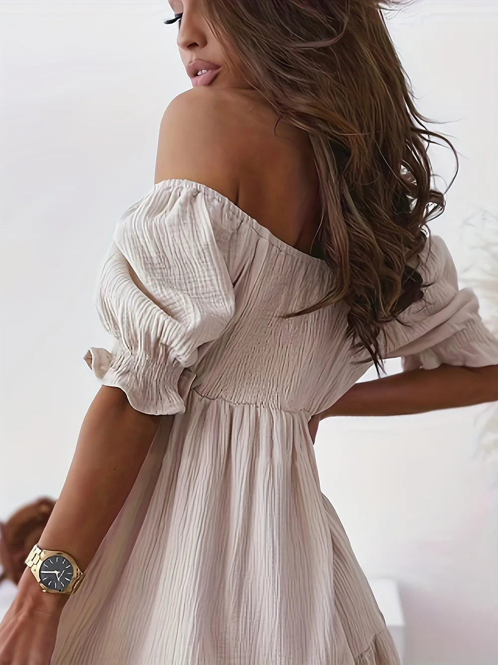 Light beige Ruffled Off-Shoulder Short Sleeve Dress with ruched and sheer details, made of polyester and cotton, imported from Fashion Nova.