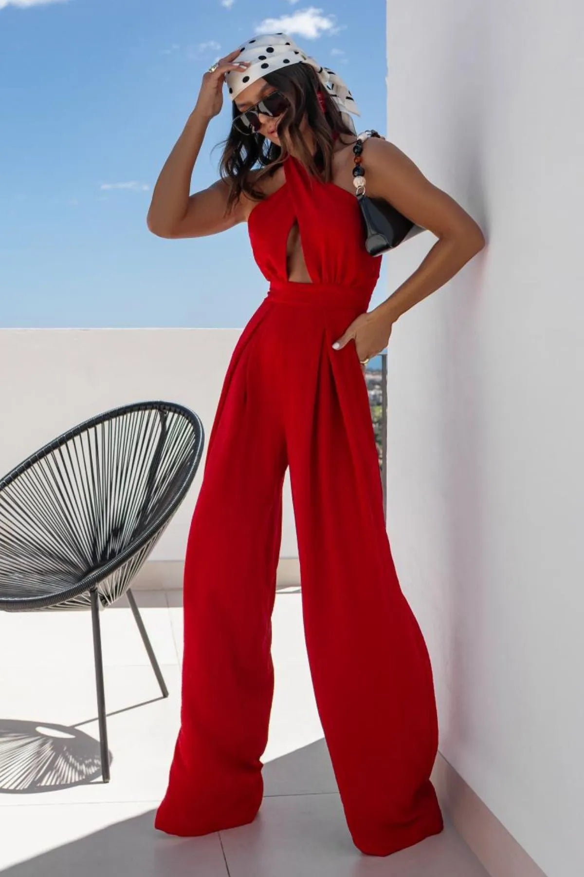 Max Origin's Halter Neck Wide Leg Jumpsuit with Keyhole Detail features a backless cutout and crisscross design perfect for summer.