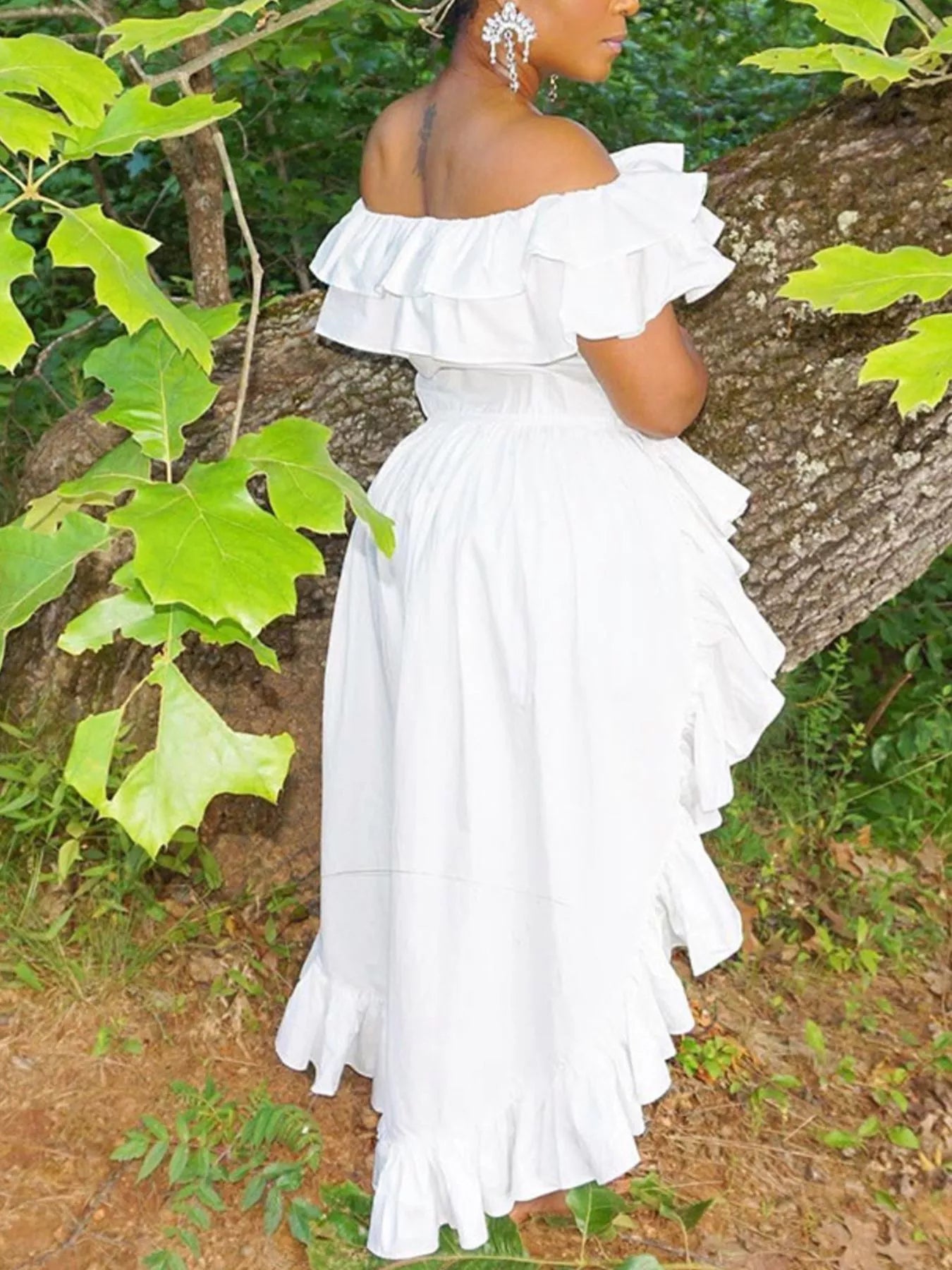 Ruffle Off-Shoulder High-Low Blouse with tiered ruffles, white polyester blend, worn outdoors.