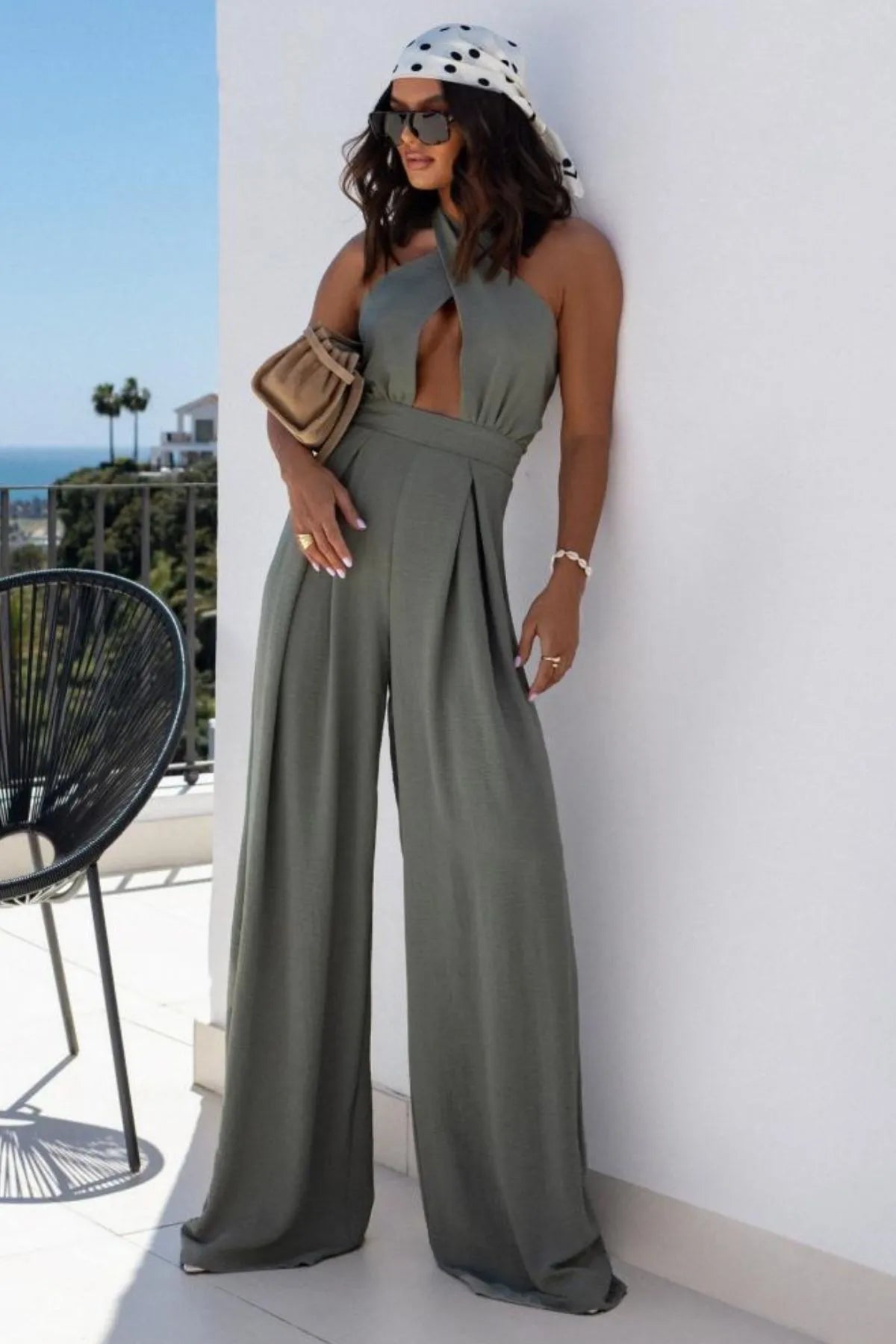 Halter Neck Wide Leg Jumpsuit with Keyhole Detail from Max Origin featuring cutout, backless design, and crisscross style.