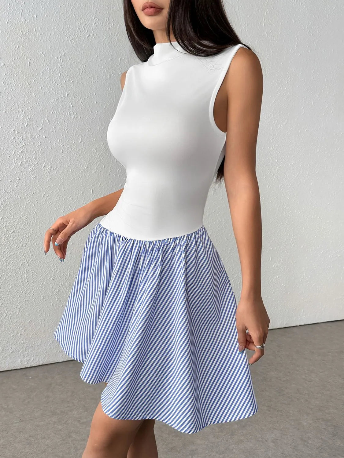 Stylish Striped Mock Neck Sleeveless Mini Tank Dress featuring a stretchy design, perfect for any casual occasion.