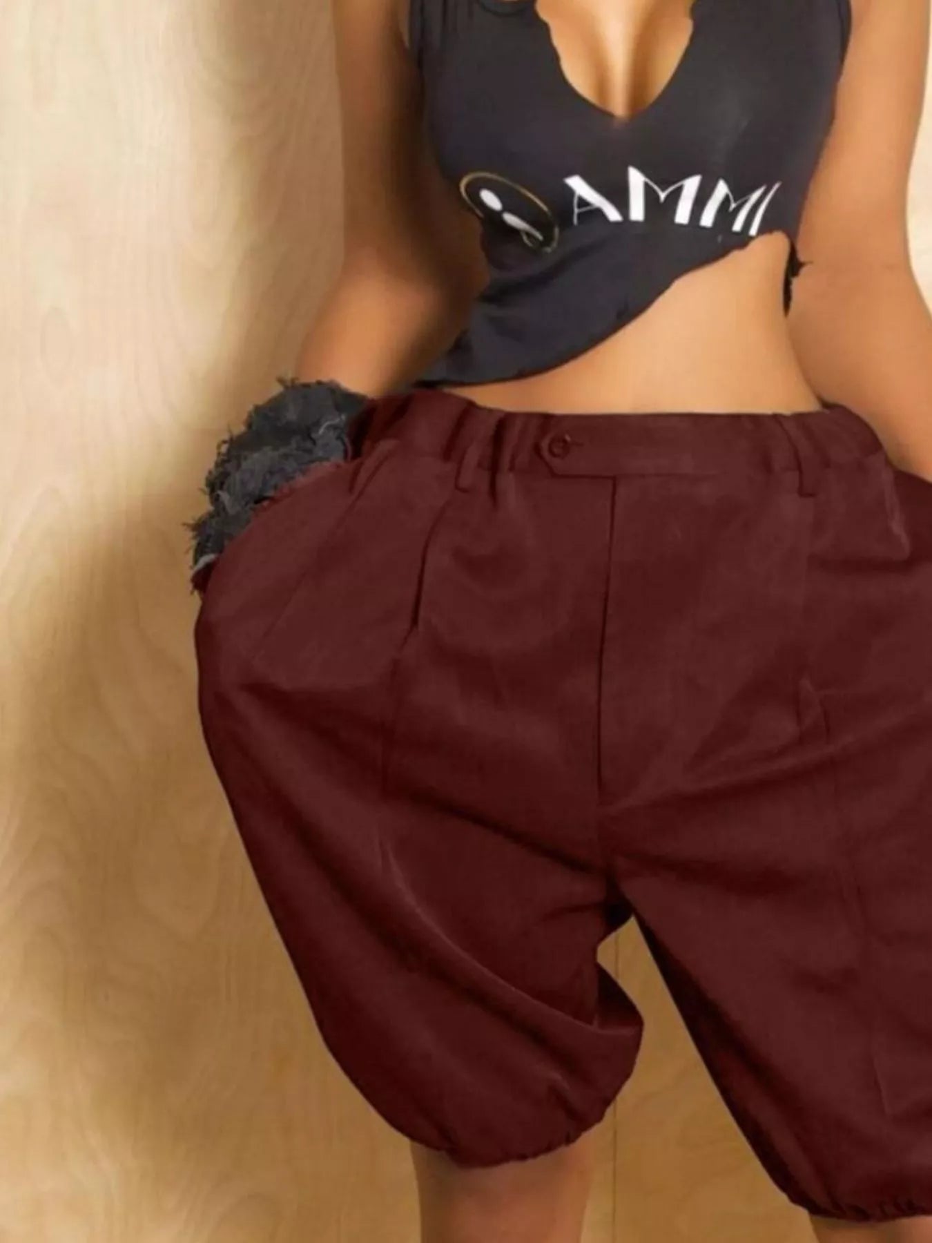 Pleated Detail High Waist Shorts in burgundy with drawstring, pockets, and elastic-cuffed hems.
