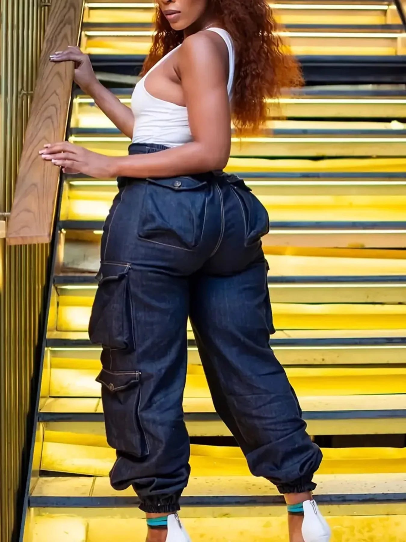 Curvy Couture Cargo Denim pants featuring a flattering silhouette, large side pockets, and elastic cuffs for comfortable everyday style.