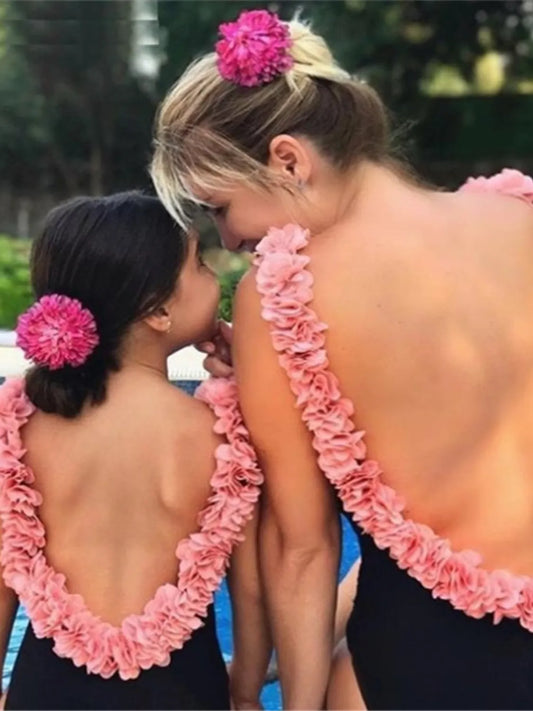 Mother and daughter wearing the Backless Petal Strap Parent-Child Swimsuit, perfect for stylish summer fun.